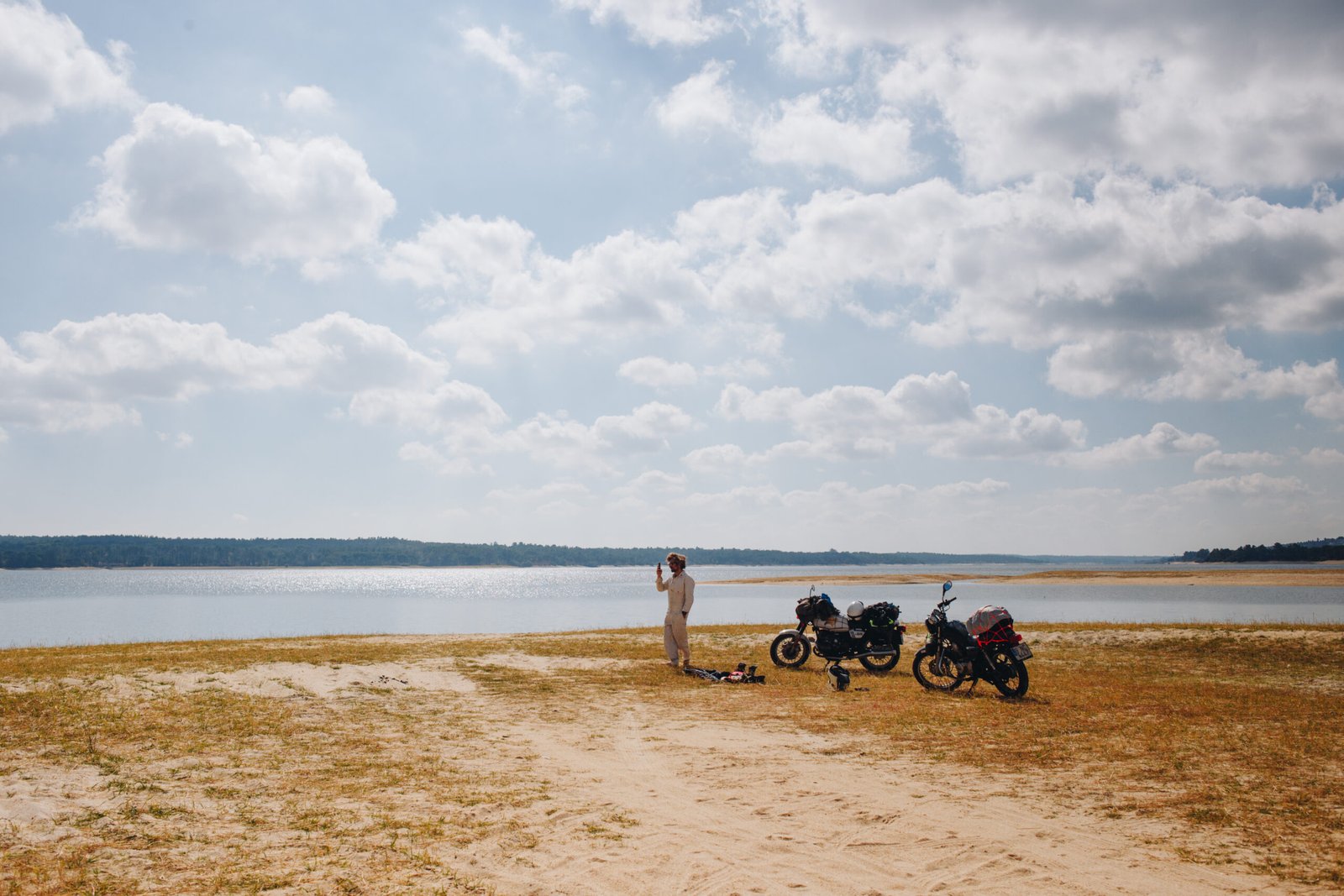Motorcycle parked next to lake. Riding in Australia